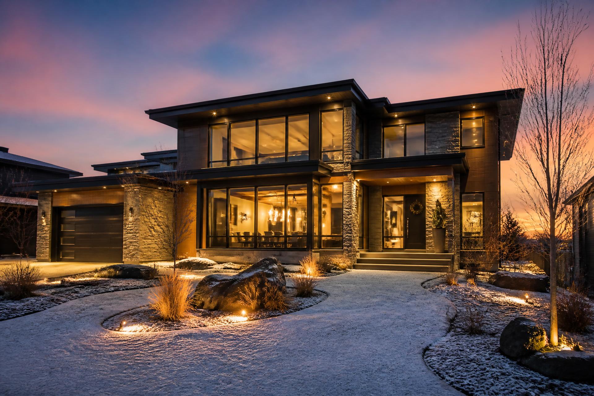 Contemporary Edmonton home illuminated at dusk